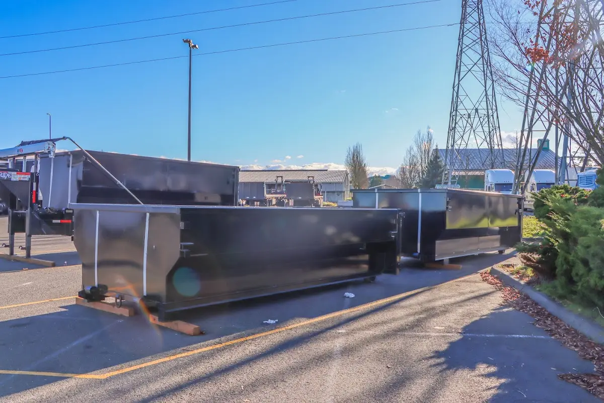 Roll-off dumpster ready for waste disposal at job site for Concrete Dumpster Rental in Halfway